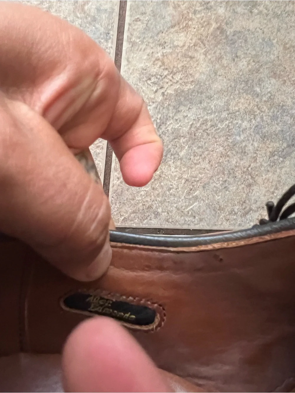 Allen Edmonds leather split